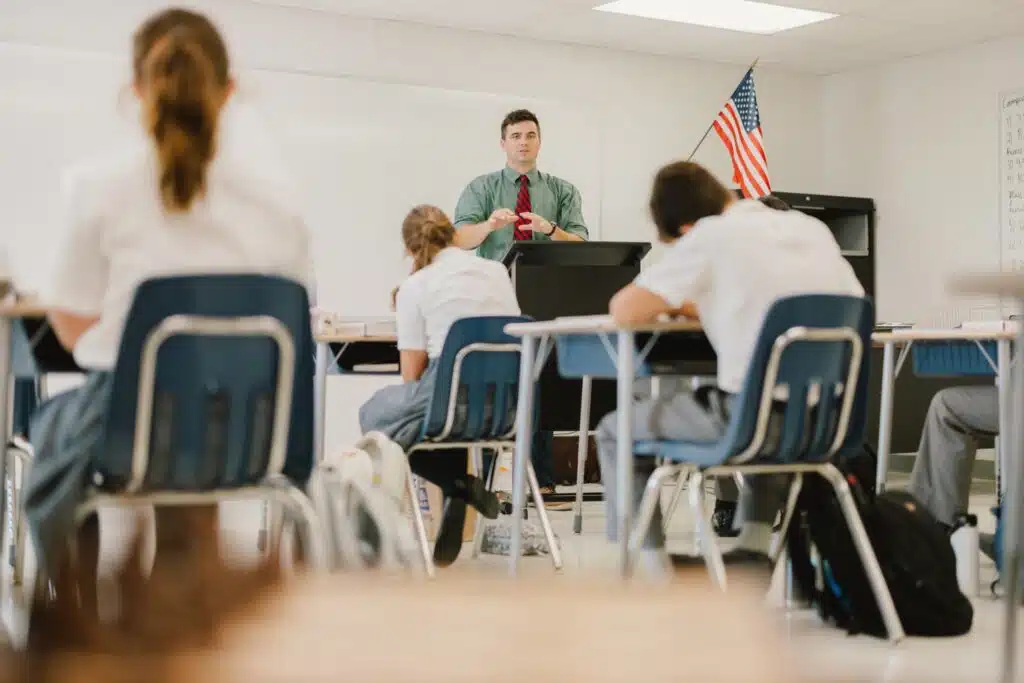 Arete Scholars -Teacher and kids in a classroom