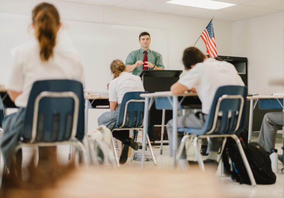 Arete Scholars -Teacher and kids in a classroom